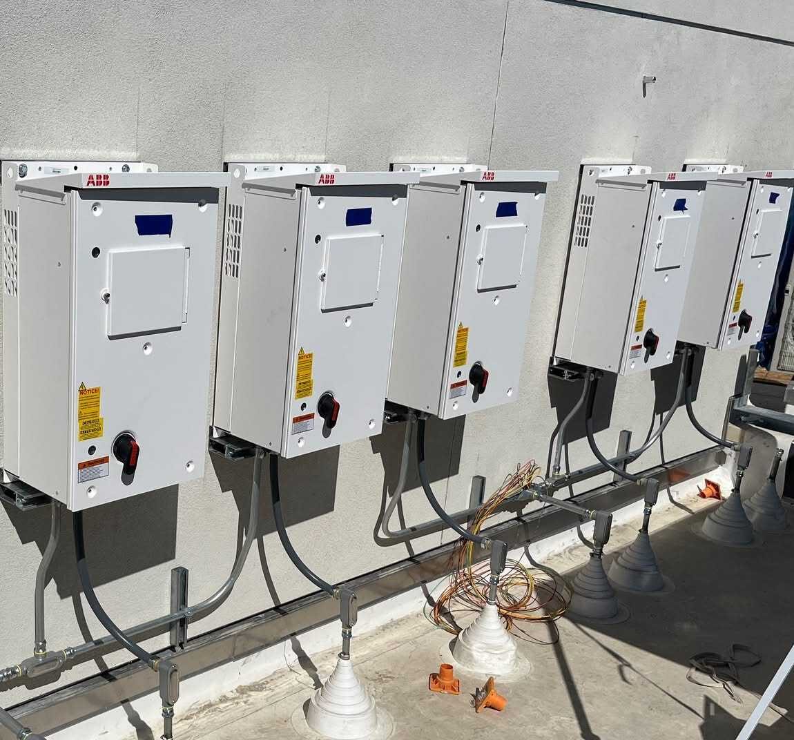 A bank of newly installed electrical disconnects on a commercial job by All Covered Electric